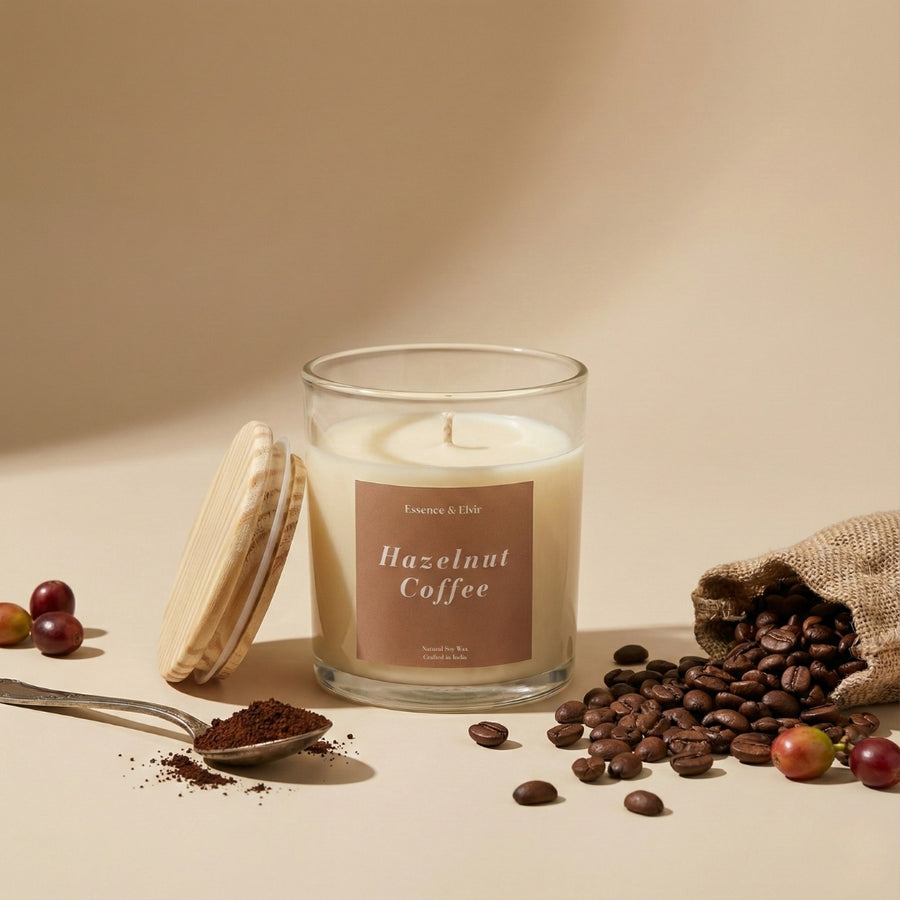 Candle labeled 'Hazelnut Coffee' with coffee beans and a scoop on a beige background